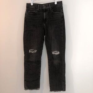 Levi’s black ripped jeans